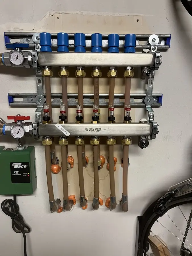 Plumber performing Water Heater Repair at a residential property in Brownsburg